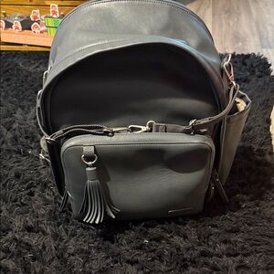 Stylish Black Backpack with Tassel